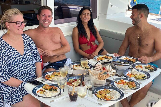 Heraklion: Dia Catamaran Tour, Lunch, Open Bar & Snorkeling - Summary of the Day