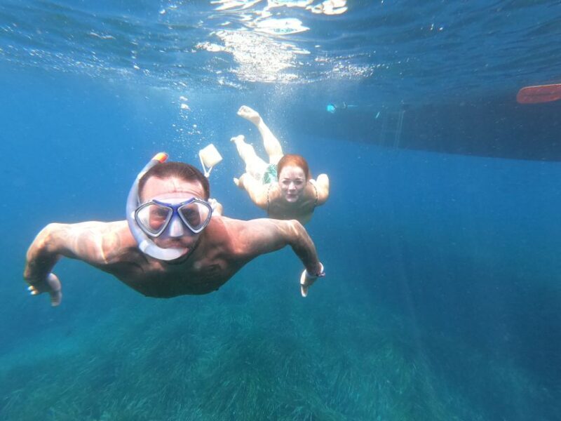 Ibiza: Boat Cruise Aboard Classic Wooden Boat - Breaking Down the Itinerary