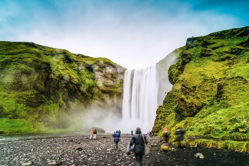 Iceland: Full-Day South Coast, Black Beach & Waterfalls Tour - Reynisfjara black sand beach: basalt columns and safety briefing