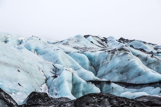 Iceland in a Day: South Coast, Glacier Hike, & Northern Lights - Scenic Drive and Waterfalls