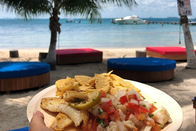 Isla Mujeres Catamaran Tour with Snorkeling at MUSA, Buffet Lunch & Open Bar - Lunch and Beach Time