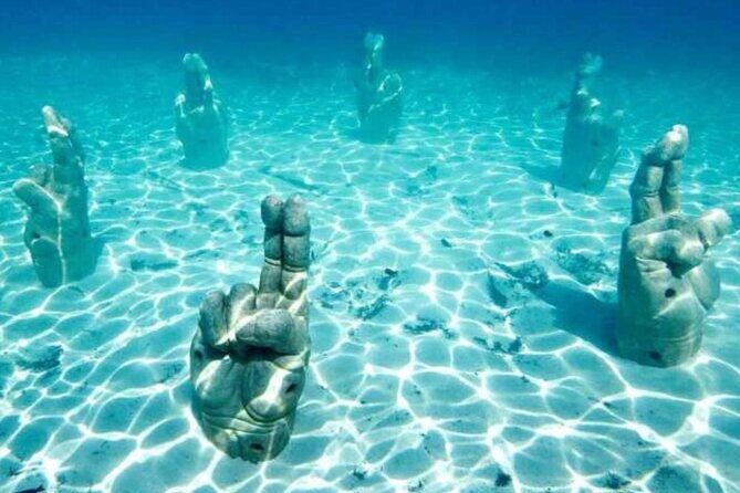 Isla Mujeres on luxury catamaran with snorkel, open bar and lunch - The Sum Up