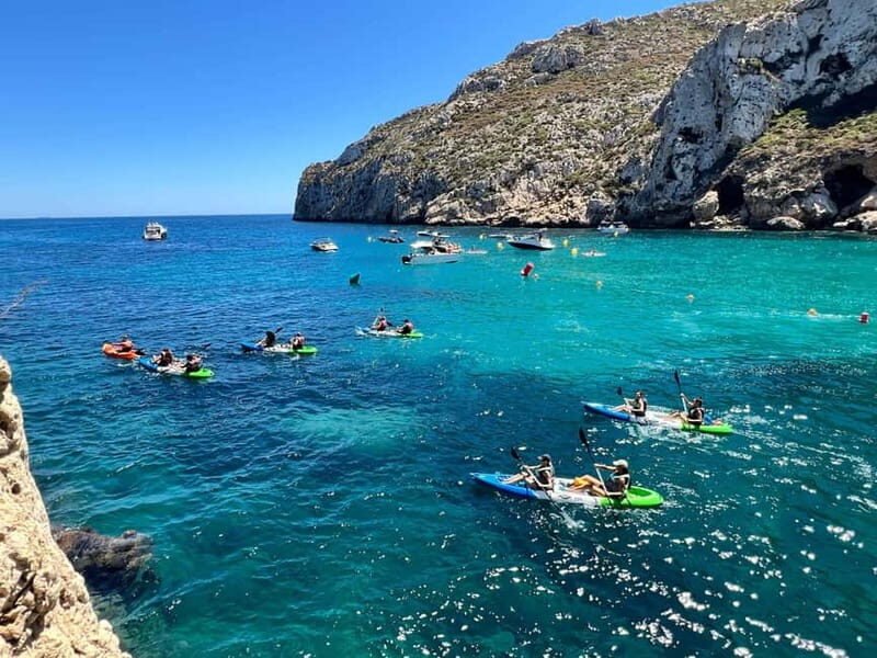 Kayak Granadella Excursión Guiada en Cuevas y Cala en Caló - Key Points