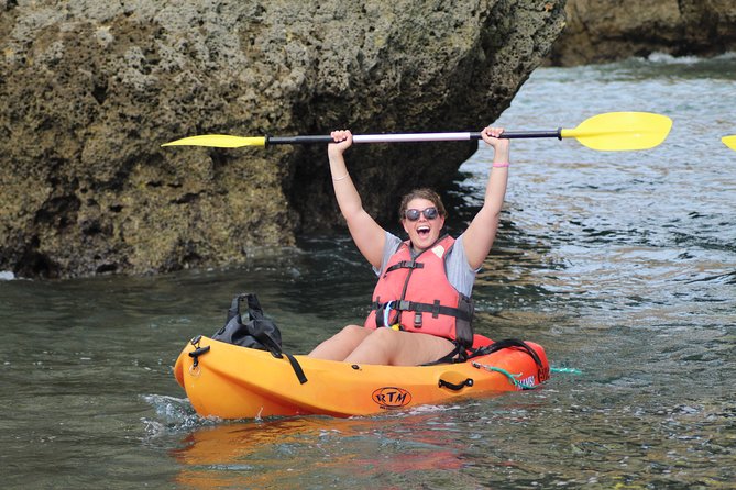 Kayak tour in Lagos to visit the caves. - Practical Logistics