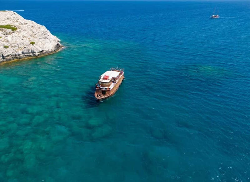 Kolympia : Transfer & Cruise to Lindos with 3 Swimming Stops - Key Points