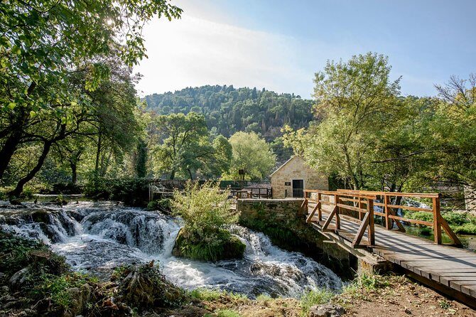 Krka Waterfalls with 30min river cruise from Split or Katela - The Experience in Action