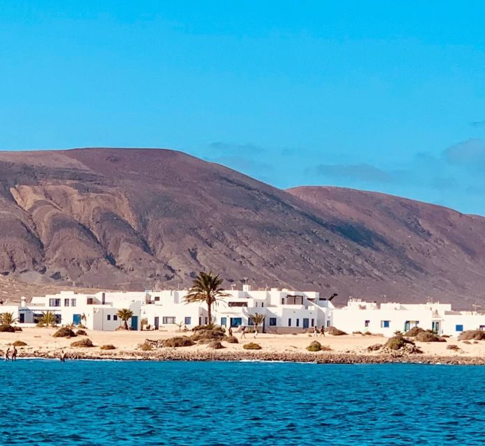 Lanzarote: Return Ferry to La Graciosa with Bus Pickup - Transportation, Timing, and Price