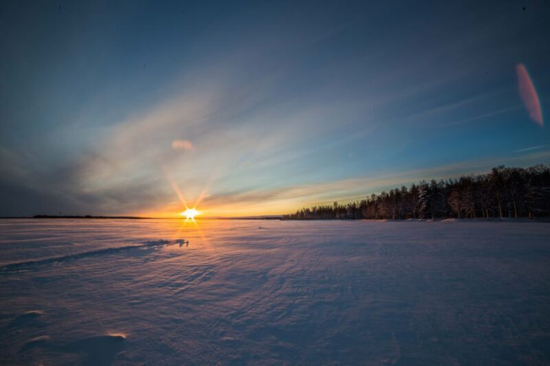 Levi: Ice Fishing on a Frozen Lake - The Scenic Surroundings and Photography Opportunities