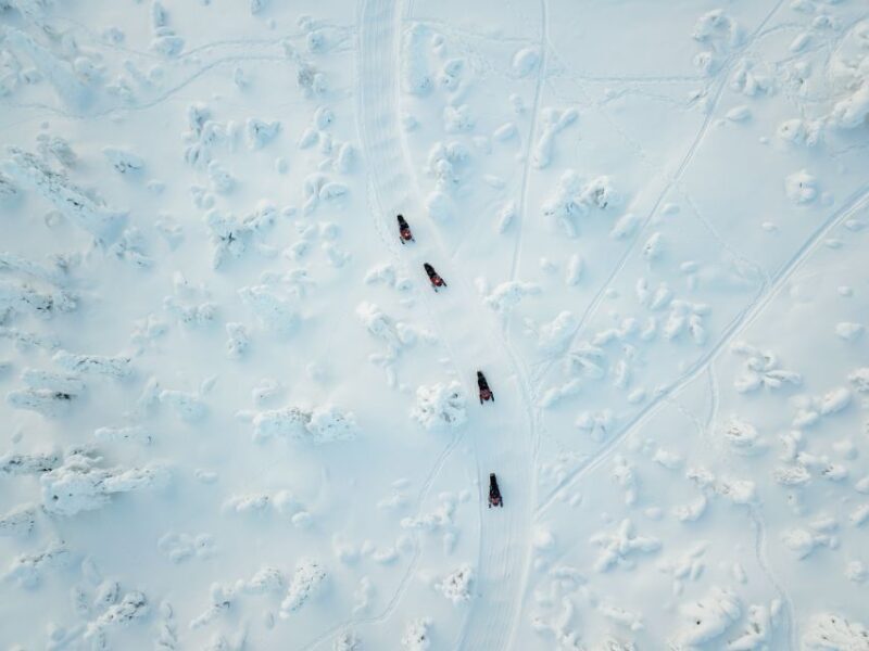 Levi: Snowmobile Safari with Ice Fishing and Outdoor Lunch - An Authentic Arctic Day in Levi