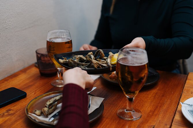 Lisbon: Award-Winning Guided Walking Food Tour with Local Drinks - Stop 3: Rua da Vitória and a Crisp Glass of Vinho Verde