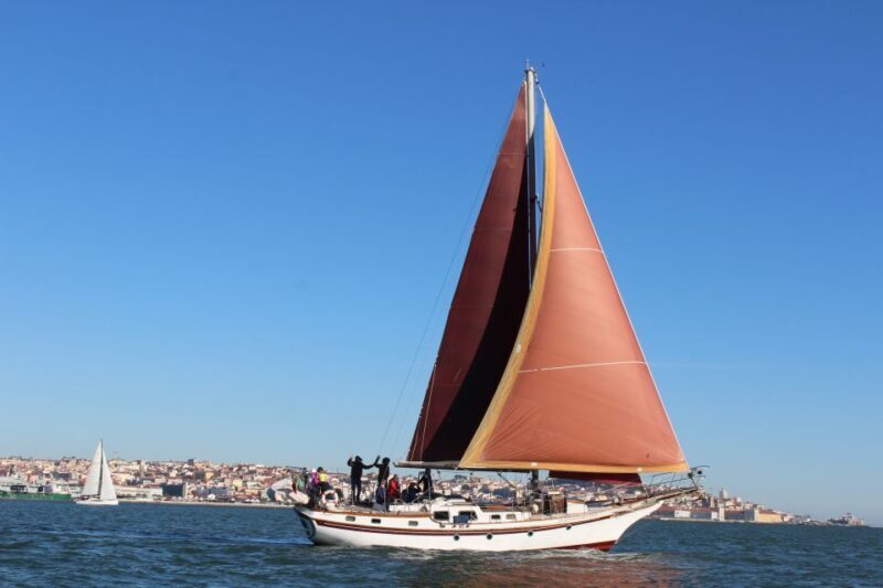 Lisbon: Daylight or Sunset on a Vintage Sailboat - Key Points