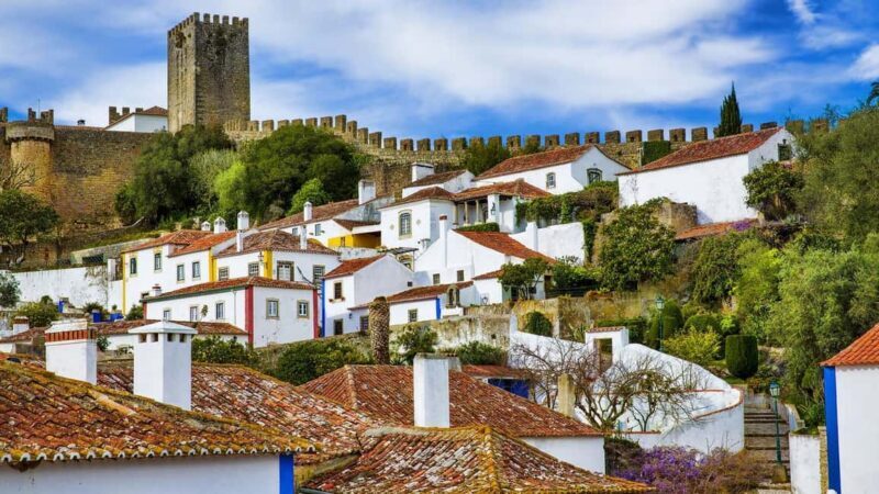 Lisbon: Dinosaur Footprints, Caves, and Obidos Tour - Key Points