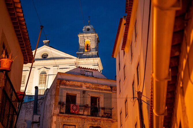Lisbon Fado Dinner Show and Panoramic Night Tour - Key Points