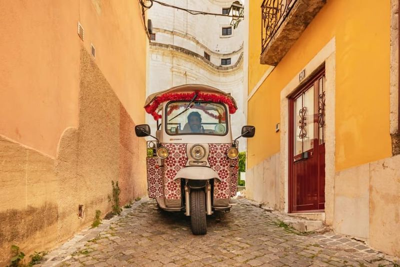 Lisbon: Private Guided Tuk-Tuk Tour with Hotel Pickup - Graça Historic District: The Romanticism Vibe in Motion