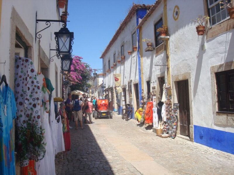 Lisbon to Porto stop Óbidos, Nazaré, Fátima, Coimbra, Aveiro - Key Points