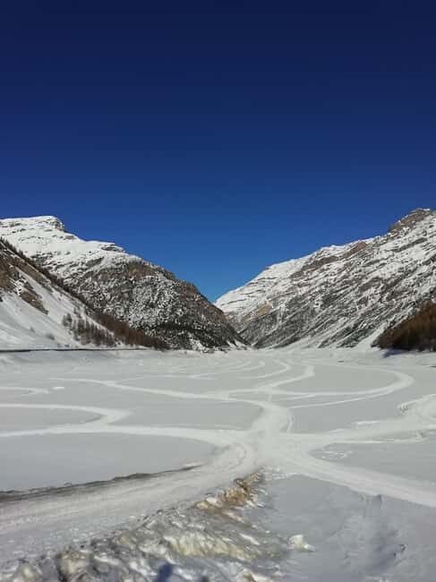 Livigno: Snowmobile Ride on Lake Livigno in the Alps - Riding as a Passenger