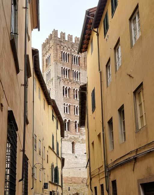 Lucca and Pisa: 1-day tour in Portuguese, with food and sightseeing. - Key Points