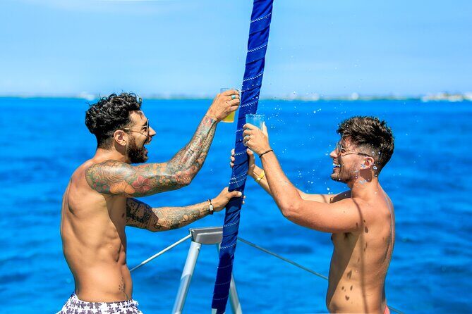 Luxury Catamaran to Isla Mujeres, Snorkeling, Buffet and Ice Bar - The Experience: A Closer Look at the Tour