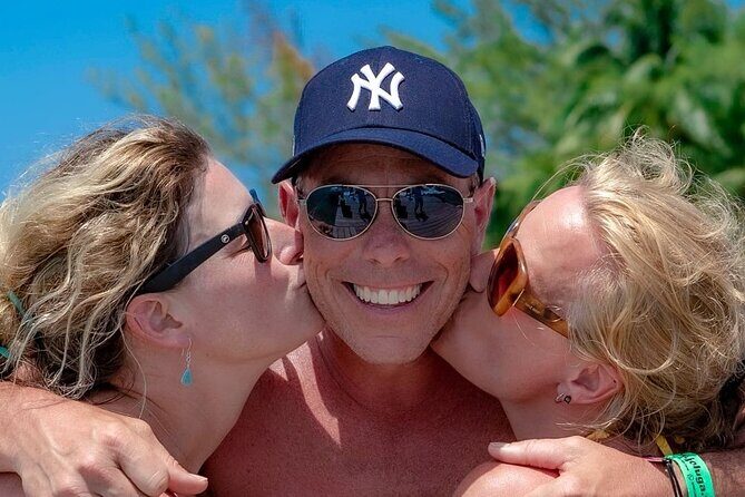 Luxury Catamaran to Isla Mujeres, Snorkeling, Buffet and Ice Bar - Who Should Consider This Tour?