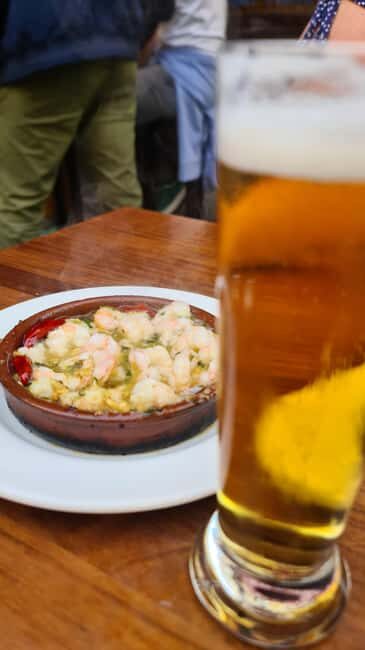 Madrid: Guided Tapas Walking Tour - Middle Stops: Exploring Madrid’s Food Diversity