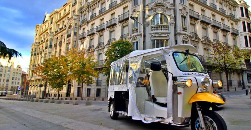 Madrid: Traditional Tour wh Private guide in yellow Tuk Tuk - Discovering Madrid in a Compact Hour