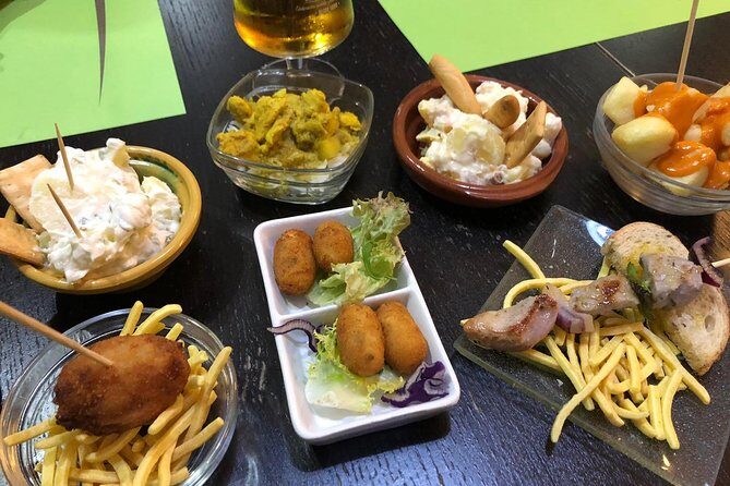 Malaga Food Tour: Tapas, Drinks and Delights with a Local - Key Points