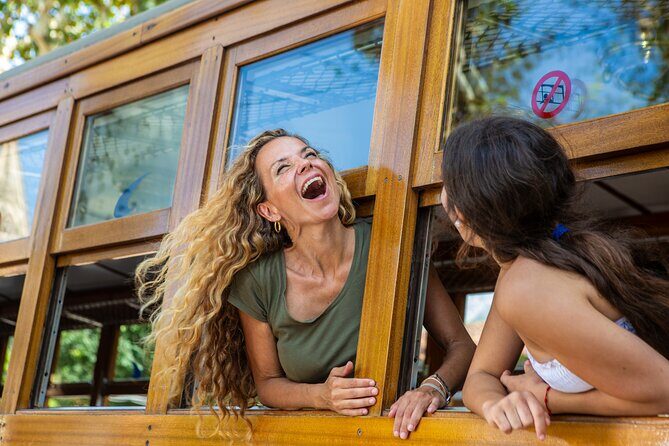 Mallorca in One Day Sightseeing Tour with Boat Ride and Vintage Train - Port Soller and the Tram