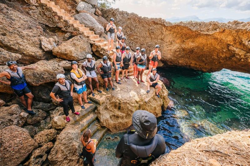 Mallorca: Kayaking, Sea Cave, Cliff Jumping & Snorkel Tour - Snorkeling in crystal-clear water with marine life viewing