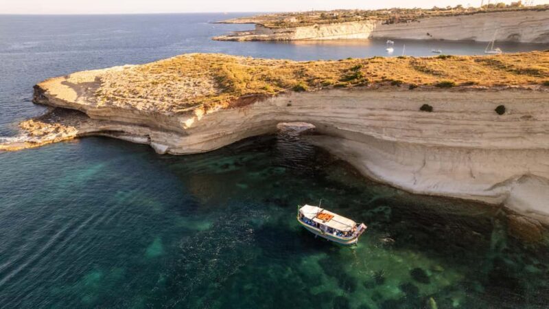 Malta: Sunset Boat Tour to St. Peters Pool and South Coast - Historic Salt Pans and the Marsaxlokk Lighthouse