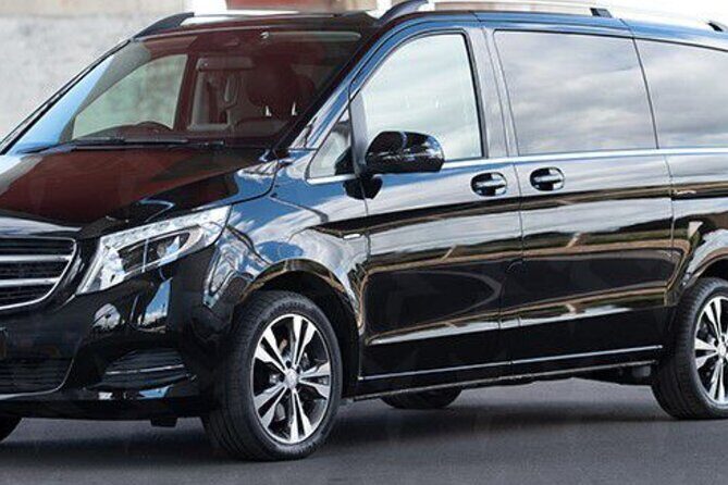 Melbourne Hotel to Airport Private Departure Transfer 12 seater mini bus - The Sum Up