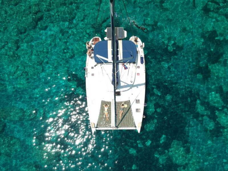 Milos: Full-Day Catamaran Cruise with Paddle Board - Swimming, Snorkeling & Paddle Boarding