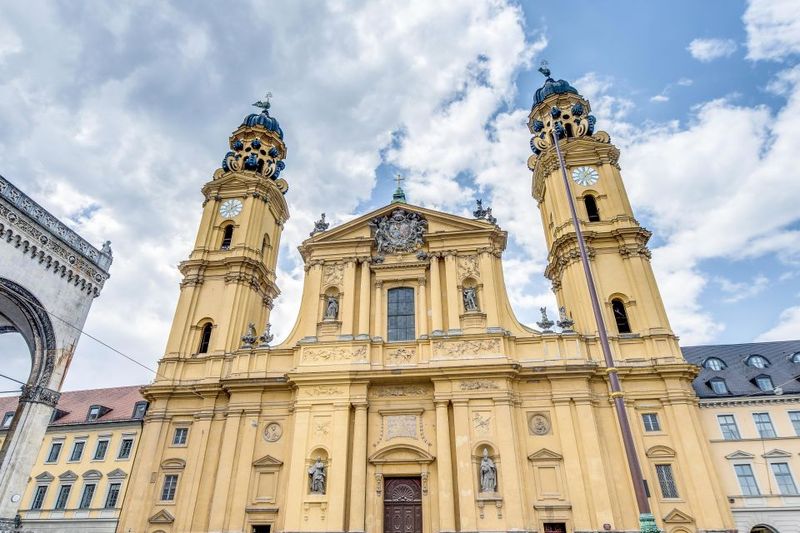 Munich: Old Town & Viktualienmarkt City Walk in German - Theatine Church: a contrasting stop that changes the feel