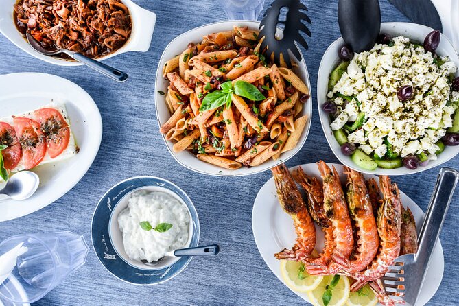 Mykonos Catamaran Premium Day-Sunset Tours 8-flavor Meal & Drinks - Windy-day switch: south coast beach time instead