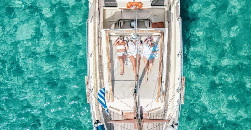 Mykonos: Private Cruise by Wooden Boat with Snorkeling - Key Points