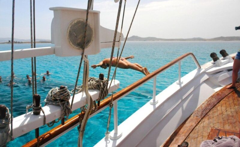 Mykonos: Sunset Party Boat Cruise with 1 Drink - The Swim Stop at Agios Stefanos