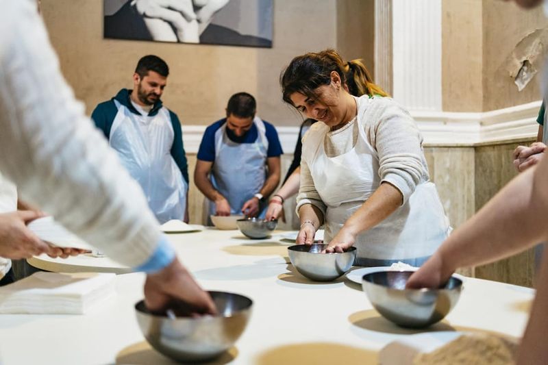 Naples: Pizza-Making Workshop with Drink and Appetizer - Chef energy: clear instruction and fun leadership