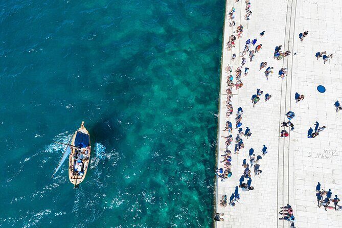 NEW! Zadar Traditional Boat Ride & Old Town Walking Tour by uur - Exploring Zadar from Land and Sea: A Dive into the Traditional Boat Ride & Old Town Walking Tour