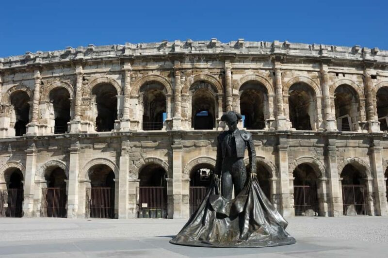 Nimes: Ancient Roman Arena Ticket & Old Town Audio Tour - A Closer Look at the Experience