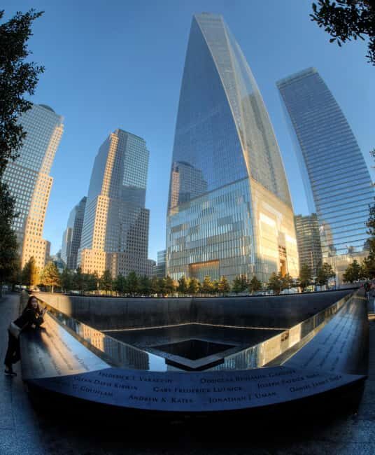 NYC: Financial District Guided Walking Tour English-Spanish - Key Points