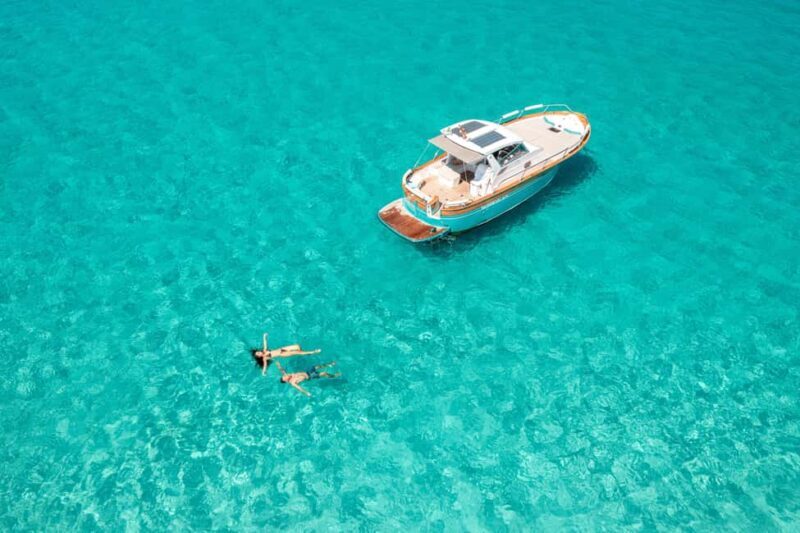 Palau: Hybrid Eco Boat Tour in Costa Smeralda with Aperitif - The Itinerary and Weather Flexibility