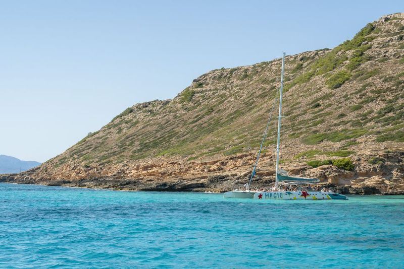 Palma de Mallorca: 5-Hour Catamaran Cruise with Lunch & Swim - Stop #1: Portals Vells or Cala Vella Anchor Drop