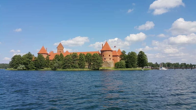 Paneriai Holocaust Site, Trakai Castle & Rumsiskes Day Tour - Key Points