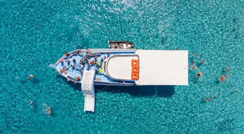 Paphos Blue Lagoon Cruise: Slide, Music & Hotel Transfer - Hotel Transfers and Scenic Drive