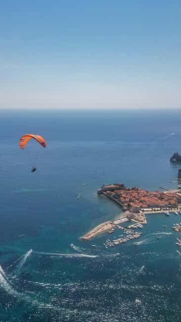 Paragliding in Budva with Certified Pilot (All-Inclusive) - Capturing Memories