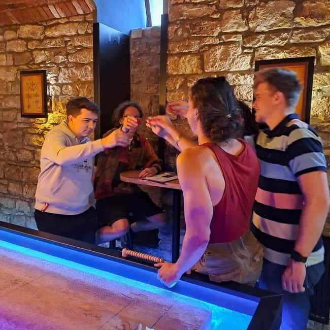 Ping pong or shuffleboard for up to 6 players - A Friendly Look at Crew Bar Prague’s Ping Pong and Shuffleboard Experience
