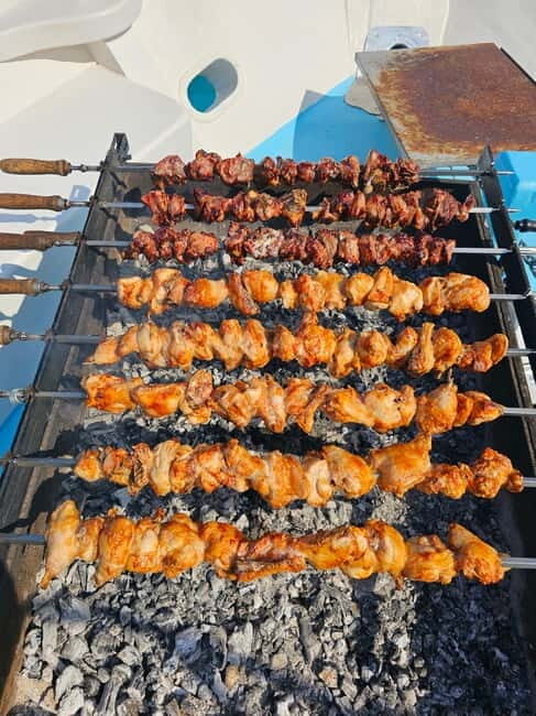 Polis: Blue Lagoon Boat Tour with Optional Barbecue Lunch - Visiting the Baths of Aphrodite