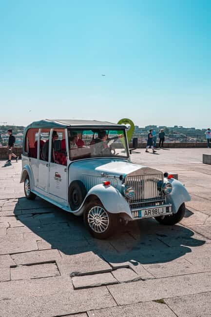 Porto: City Center Eco Car Tour - Key Points