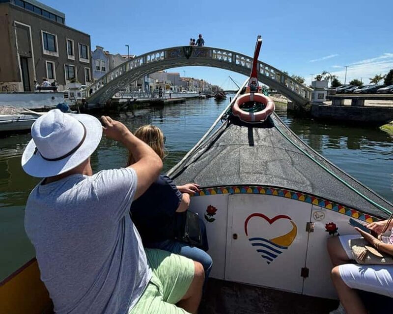 Porto: Coimbra, Aveiro, and Costa Nova Day Trip with Boat - Key Points