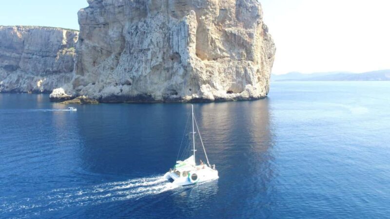 Porto Conte: Half-day catamaran tour with aperitif - Key Points