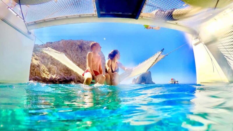 Porto Conte: Half-day catamaran tour with aperitif - Indulging in Sardinian Flavors